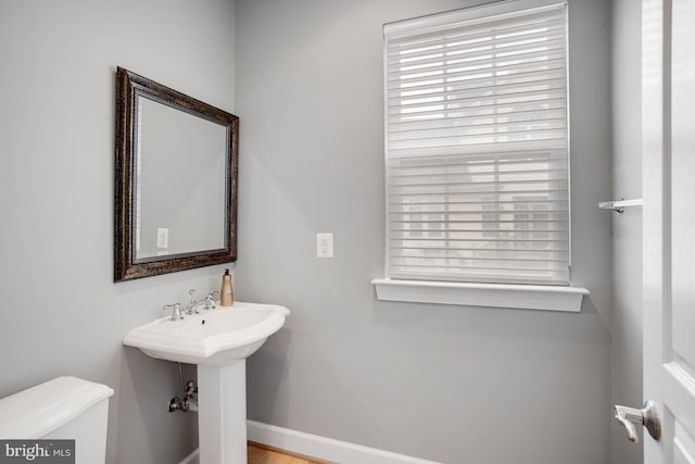 16340 Sandy Ridge Ct, Woodbridge, VA 22191 - bathroom with toilet and baseboards