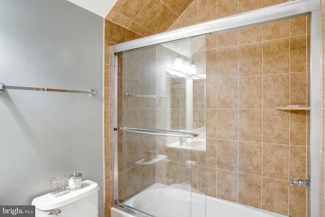 16340 Sandy Ridge Ct, Woodbridge, VA 22191 - bathroom featuring bath / shower combo with glass door and toilet