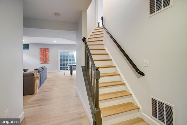 16340 Sandy Ridge Ct, Woodbridge, VA 22191 - stairway with wood finished floors, baseboards, and recessed lighting