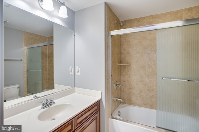 16340 Sandy Ridge Ct, Woodbridge, VA 22191 - full bathroom with combined bath / shower with glass door, vanity, and toilet