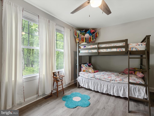 bedroom featuring wood finished floors and ceiling fan