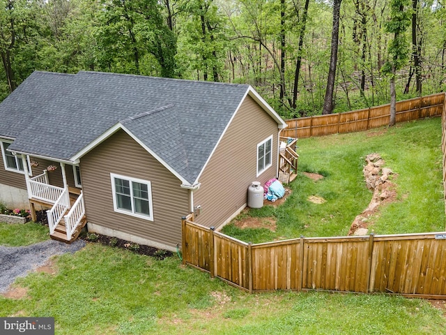 view of front of home featuring a shingled roof