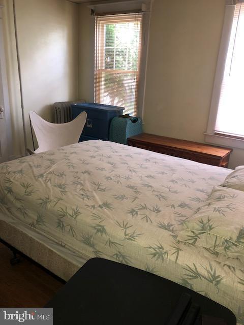 3812 Gwynn Oak Ave, Baltimore, MD 21207 - bedroom featuring multiple windows
