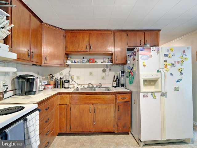 kitchen with white appliances, a sink, open shelves, tasteful backsplash, and brown cabinetry