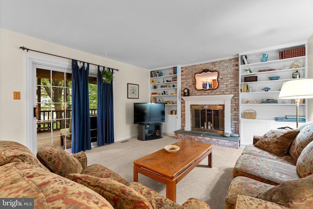 carpeted living room featuring a fireplace, baseboards, and built in shelves