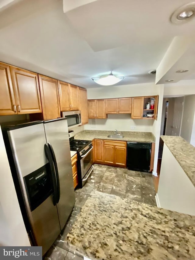 2624 Redcoat Dr Unit 2B, Alexandria, VA 22303 - kitchen featuring appliances with stainless steel finishes, a sink, light countertops, and open shelves