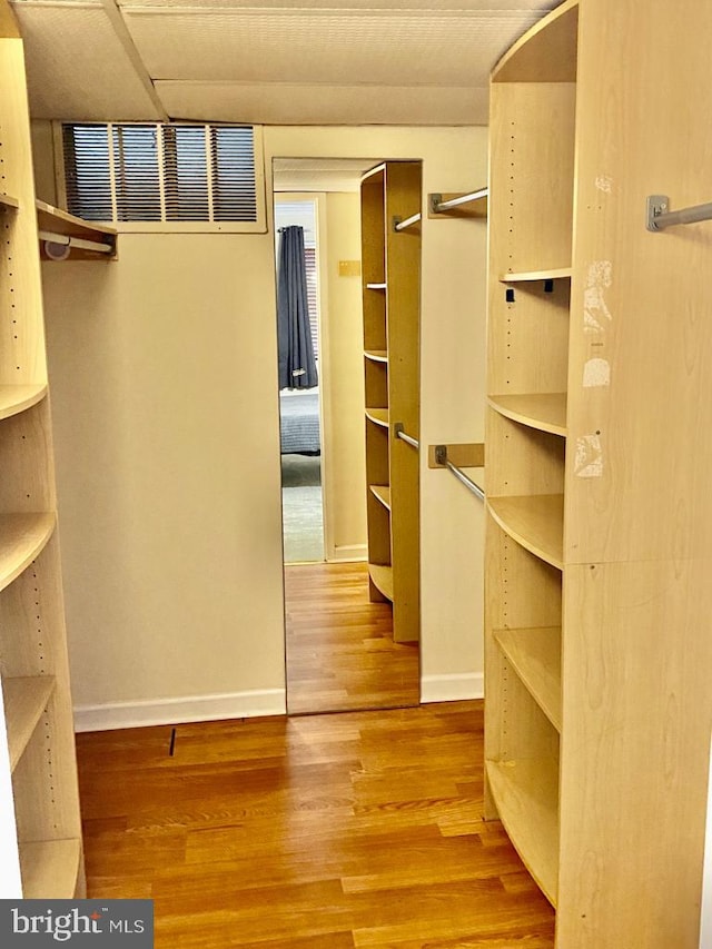 2624 Redcoat Dr Unit 2B, Alexandria, VA 22303 - walk in closet with wood finished floors