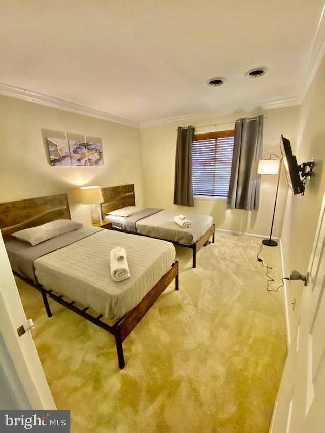 2624 Redcoat Dr Unit 2B, Alexandria, VA 22303 - carpeted bedroom featuring ornamental molding and baseboards