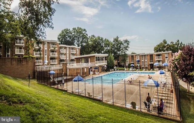 2624 Redcoat Dr Unit 2B, Alexandria, VA 22303 - community pool featuring fence and a patio