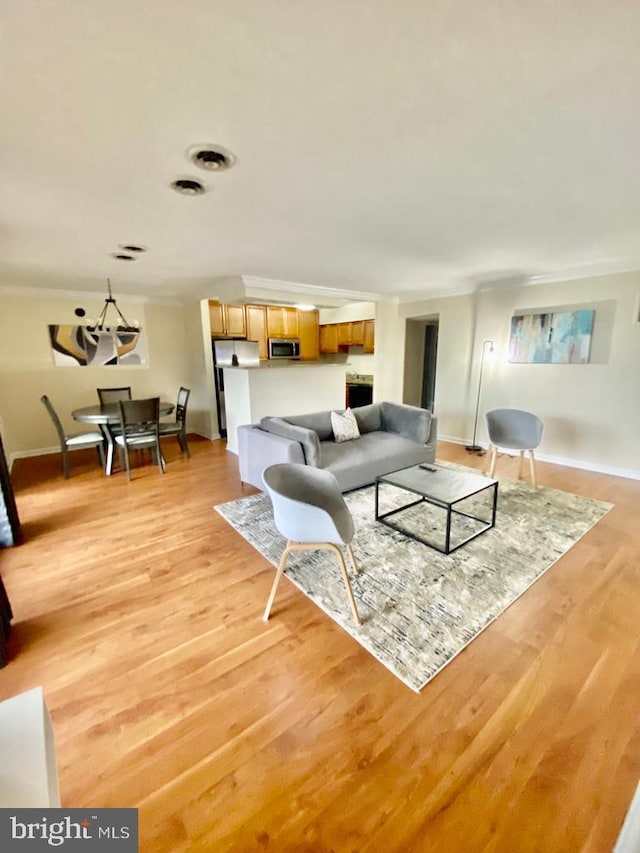 2624 Redcoat Dr Unit 2B, Alexandria, VA 22303 - living area featuring light wood-type flooring and baseboards