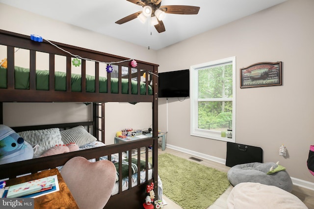309 N Glebe Rd, Montross, VA 22520 - bedroom featuring baseboards and a ceiling fan