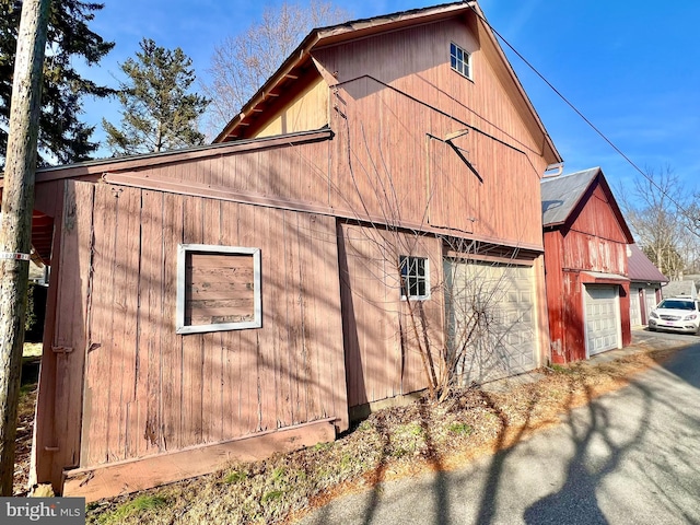 203 N Cedar St, Lititz, PA 17543 - view of property exterior featuring a detached garage, a barn, and an outbuilding