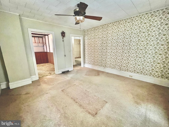 203 N Cedar St, Lititz, PA 17543 - unfurnished bedroom featuring carpet flooring, ornamental molding, baseboards, wallpapered walls, and ceiling fan