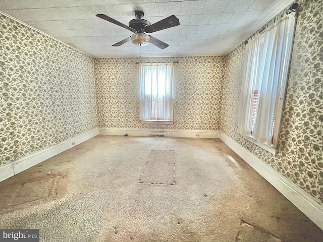 203 N Cedar St, Lititz, PA 17543 - carpeted empty room with wallpapered walls, ceiling fan, and baseboards