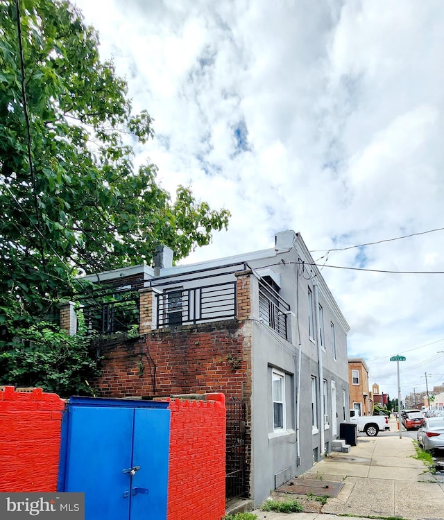 2067 W Stella St, Philadelphia, PA 19132 - view of side of home with stucco siding