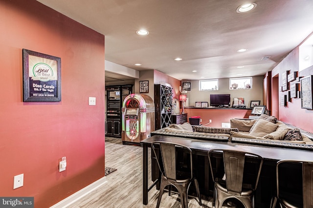7140 Poole Jones Rd, Frederick, MD 21702 - living area featuring light wood-style floors, recessed lighting, and baseboards