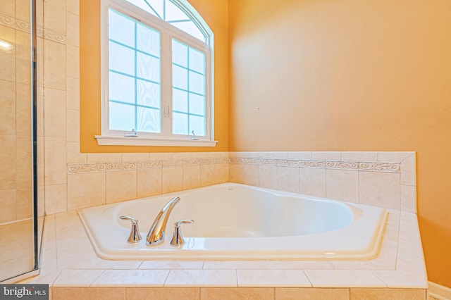 bathroom featuring a bath