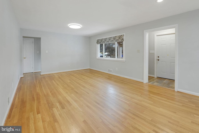 1305 S Buchanan St S, Arlington, VA 22204 - spare room featuring light wood-style flooring and baseboards