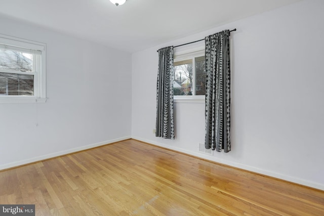 1305 S Buchanan St S, Arlington, VA 22204 - empty room with wood finished floors and baseboards