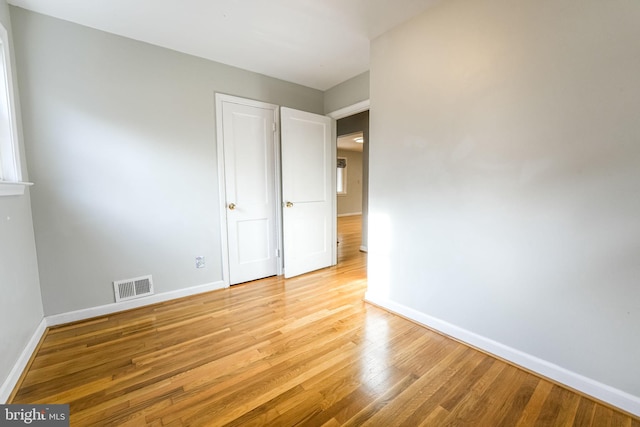 1305 S Buchanan St S, Arlington, VA 22204 - unfurnished bedroom featuring baseboards and light wood-type flooring