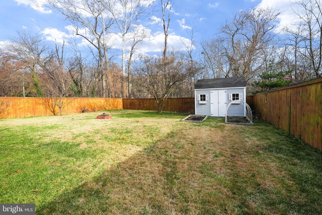 1305 S Buchanan St S, Arlington, VA 22204 - view of yard featuring a storage shed, an outdoor structure, and an outdoor fire pit