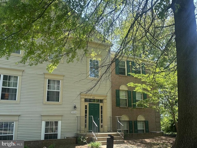 1110 Huntmaster Ter NE Unit 302, Leesburg, VA 20176 - view of front facade with brick siding