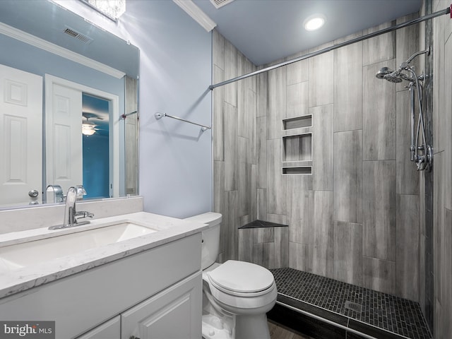 1110 Huntmaster Ter NE Unit 302, Leesburg, VA 20176 - full bath with crown molding, toilet, vanity, and tiled shower