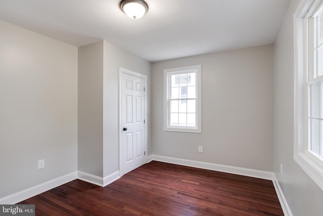 3411 Roselawn Ave, Baltimore, MD 21214 - unfurnished room with dark wood-style flooring and baseboards