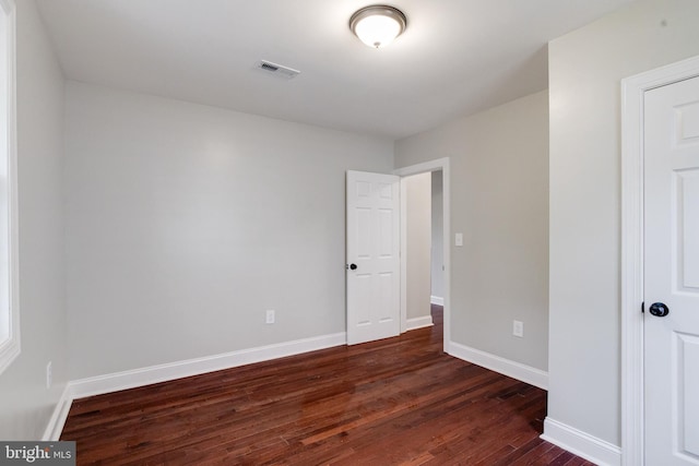 3411 Roselawn Ave, Baltimore, MD 21214 - unfurnished bedroom featuring dark wood-style flooring and baseboards