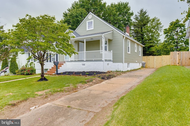 3411 Roselawn Ave, Baltimore, MD 21214 - view of front facade featuring a porch and a chimney