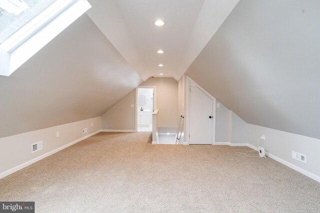 3411 Roselawn Ave, Baltimore, MD 21214 - bonus room with a skylight, light carpet, lofted ceiling, baseboards, and recessed lighting