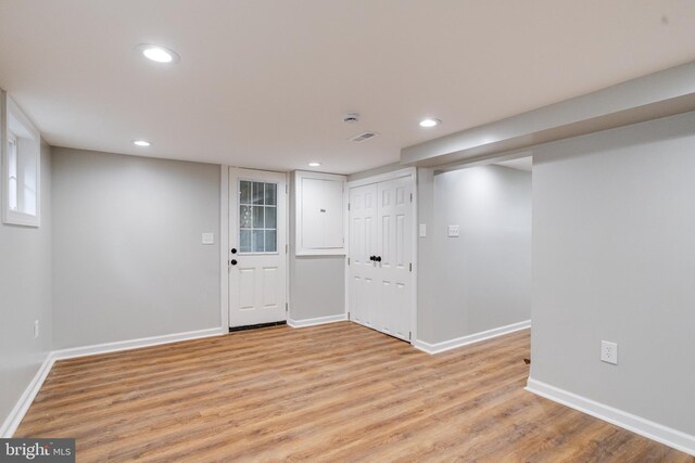 3411 Roselawn Ave, Baltimore, MD 21214 - finished below grade area featuring recessed lighting, light wood finished floors, and baseboards