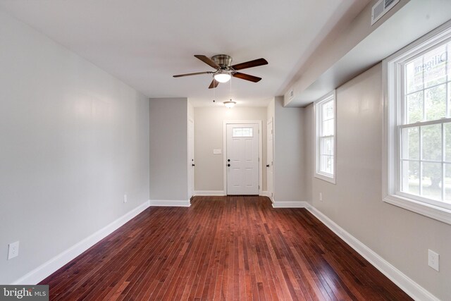 3411 Roselawn Ave, Baltimore, MD 21214 - foyer entrance with dark wood-type flooring, ceiling fan, and baseboards