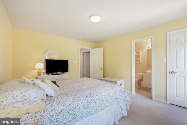 bedroom featuring light carpet and baseboards