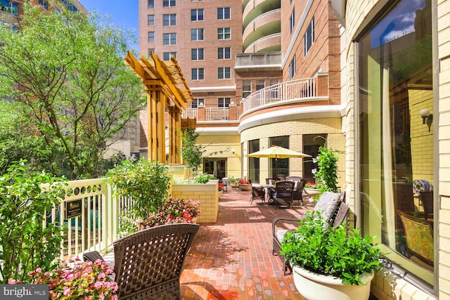 900 N Taylor St Unit 1105, Arlington, VA 22203 - view of patio / terrace featuring a balcony and outdoor dining area