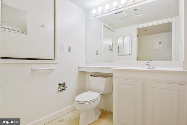 900 N Taylor St Unit 1105, Arlington, VA 22203 - bathroom with baseboards, tile patterned flooring, toilet, and vanity