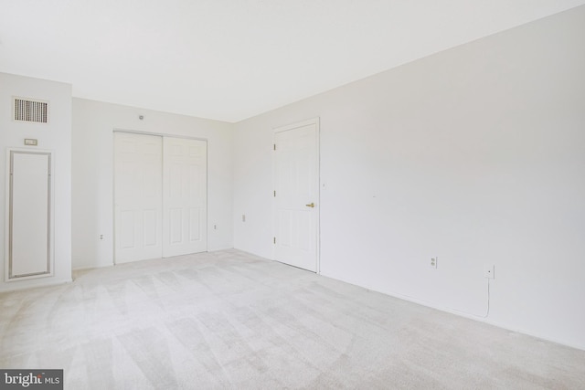 900 N Taylor St Unit 1105, Arlington, VA 22203 - unfurnished bedroom with light carpet and a closet