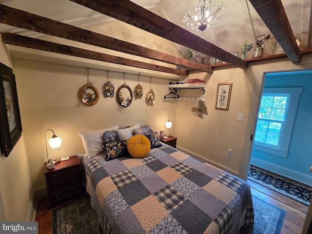 314 Bohemia Ave, Chesapeake City, MD 21915 - bedroom with beam ceiling, a chandelier, baseboards, and wood finished floors