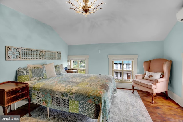 314 Bohemia Ave, Chesapeake City, MD 21915 - bedroom with lofted ceiling, a chandelier, and wood finished floors