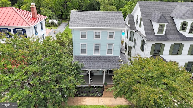 314 Bohemia Ave, Chesapeake City, MD 21915 - view of front of house with a shingled roof and a chimney