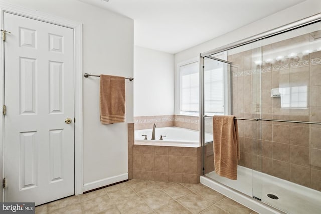 2529 Pascal Pl, Herndon, VA 20171 - full bathroom with tile patterned flooring, a shower stall, a bath, and baseboards
