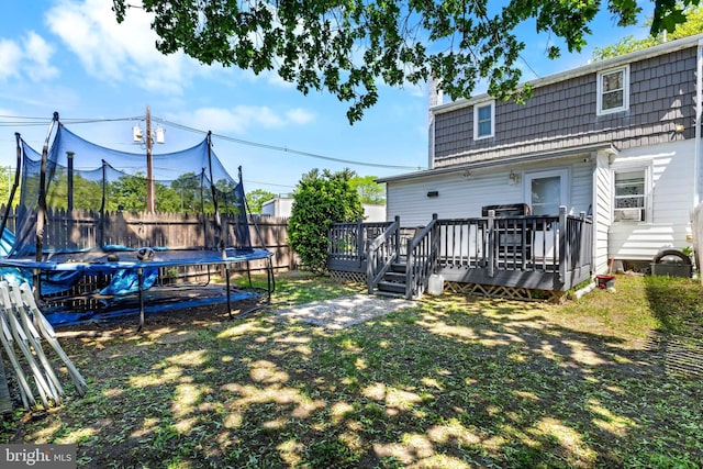 602 Lippincott Ave, Riverton, NJ 08077 - view of yard with a trampoline, a deck, and fence