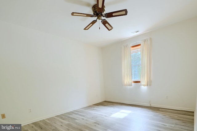 1 Brooking Ct Unit 202, Lutherville Timonium, MD 21093 - unfurnished room featuring light wood-type flooring, a ceiling fan, and baseboards