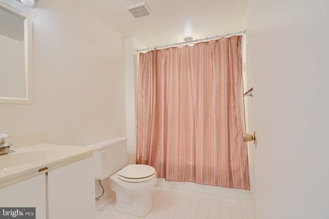 1 Brooking Ct Unit 202, Lutherville Timonium, MD 21093 - bathroom with toilet, tile patterned flooring, vanity, and a shower with curtain