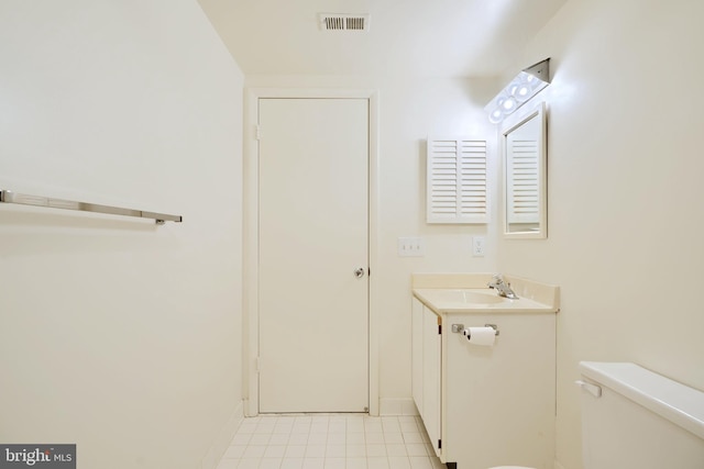 1 Brooking Ct Unit 202, Lutherville Timonium, MD 21093 - bathroom featuring toilet, vanity, and baseboards