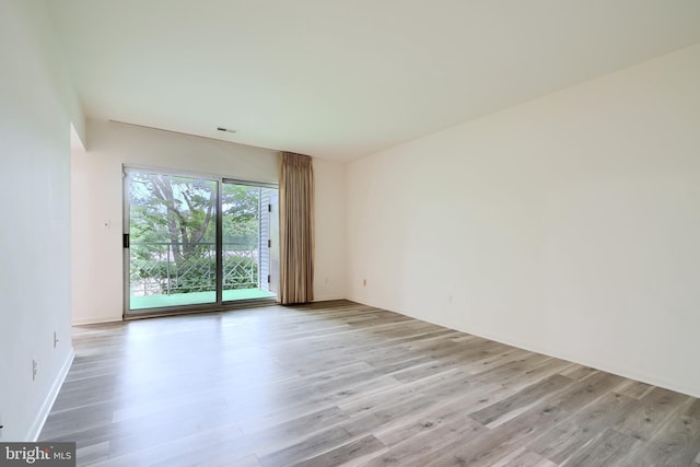 1 Brooking Ct Unit 202, Lutherville Timonium, MD 21093 - empty room featuring light wood finished floors and baseboards