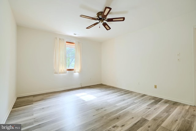1 Brooking Ct Unit 202, Lutherville Timonium, MD 21093 - unfurnished room with light wood-type flooring, a ceiling fan, and baseboards