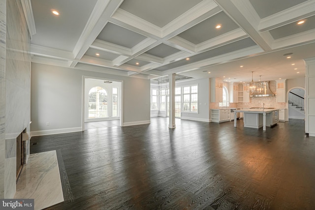 1337 Carolannes Way Unit B6, West Chester, PA 19382 - unfurnished living room with a chandelier, dark wood finished floors, baseboards, stairway, and beamed ceiling