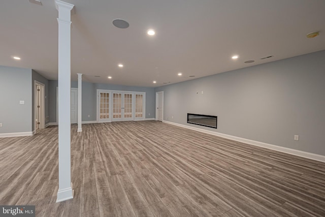 1337 Carolannes Way Unit B6, West Chester, PA 19382 - below grade area featuring wood finished floors, baseboards, recessed lighting, and a glass covered fireplace