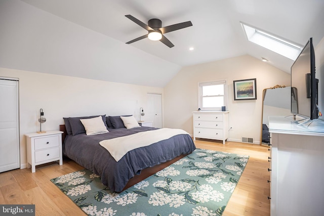 36 Gettysburg Ln, Newtown, PA 18940 - bedroom featuring vaulted ceiling, light wood-style floors, a skylight, and a ceiling fan